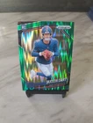 2025 Panini Prizm - Rookies Jaxson Dart #332 Green Flash Prizm (RC)