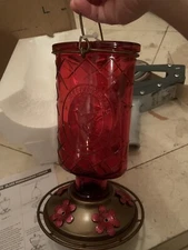 red hummingbird feeder from the Forbidden