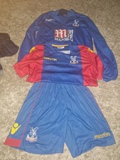 Macron-branded Crystal Palace F.C. home kit 2016-2017 Mansion sponsor