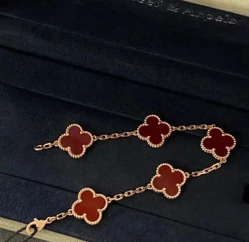 Bracelet vintage en ligne VC et Arpels Alhambra or 18 carats 5P onyx rouge