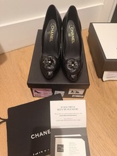 CHANEL Black CC Cap Toe Camellia Flower Pump