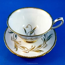 Elegant Royal Chelsea " Gold Rush " Tea Cup and Saucer Set