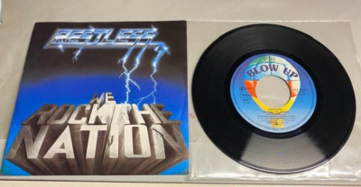 RESTLESS - ´´ROCK THE NATIONS´´B/W´´METAL CHAINS´´ RARE GERMAN METAL 7'' 1985