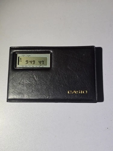 CASIO ELECTRONIC CALCULATOR AND WATCH ML-71