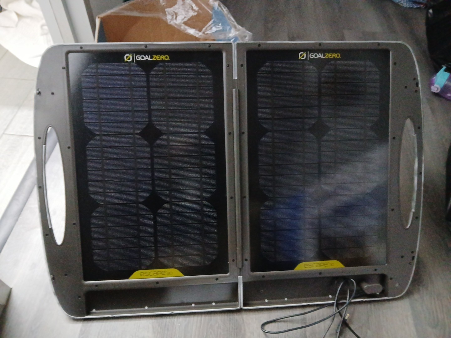 With Handle With Solar Panel Suitcase To Power It.