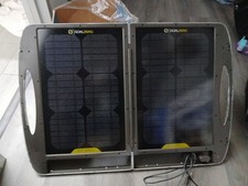 Small generator With Handle with solar panel Suitcase to power It.