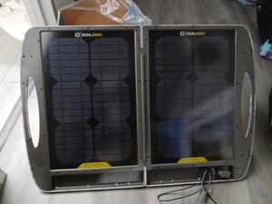 Small generator With Handle with solar panel Suitcase to power It.