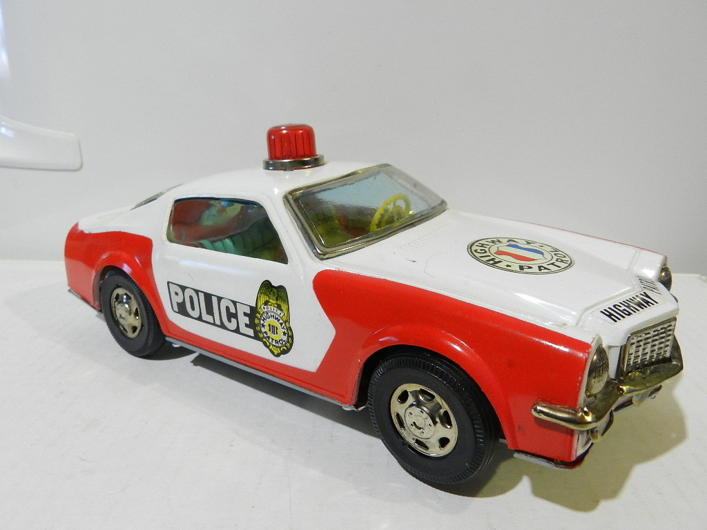 POLICE HIGHWAY PATROL CAR PLASTIC AND TIN TOY BATTERY OPERATED