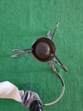 Coleman Exponent Xtreme camp stove multi-fuel model 9720-701 with carrying case