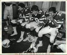 1983 Press Photo Wagner College football team back in locker room after a game