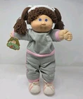 1980'sCabbage Patch Kid Brown Pigtails, Blue Eyes Gray Sweat Suit with Headband.