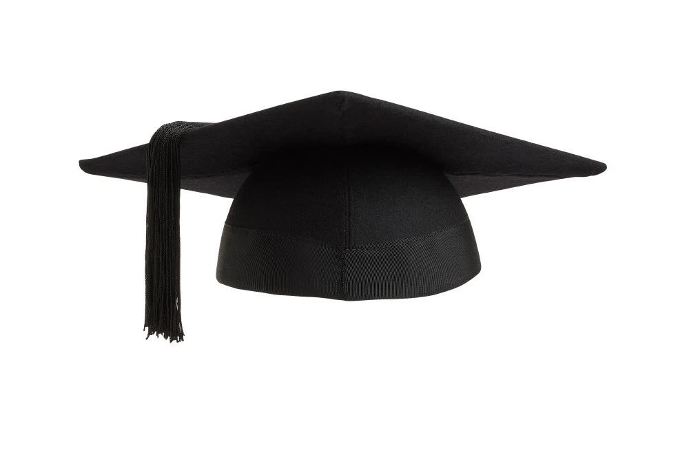 Happy graduate. Low angle view of happy young African man in graduation gown  holding his mortar board against blue sky 13583628 Stock Photo at Vecteezy