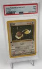 POKEMON Trading Card 2000 TEAM ROCKET 55/82 EEVEE 1st EDITION grade slab PSA 7