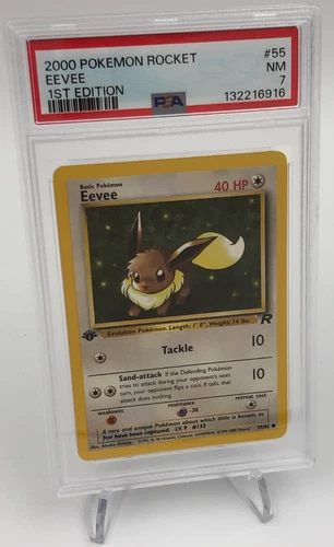 POKEMON Trading Card 2000 TEAM ROCKET 55/82 EEVEE 1st EDITION grade slab PSA 7