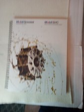 $3.45 - Mobil oil Greese, checkeredboard notebook, for notes and info