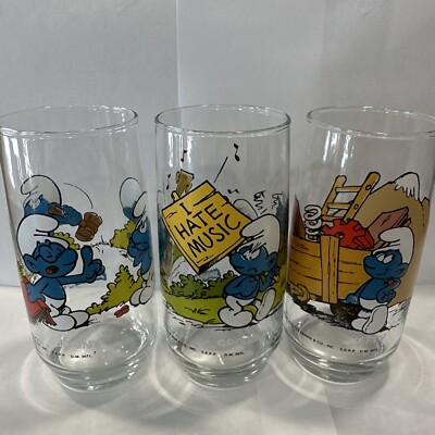 LOT OF 3 - 1982 PEYO SMURF Drinking Glasses 1 HEFTY 1  GROUCHY  1 BRAINY