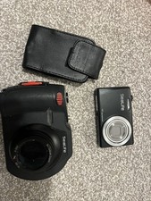 SeaLife DC1400 Underwater Camera with underwater housing and protective pouch. 
