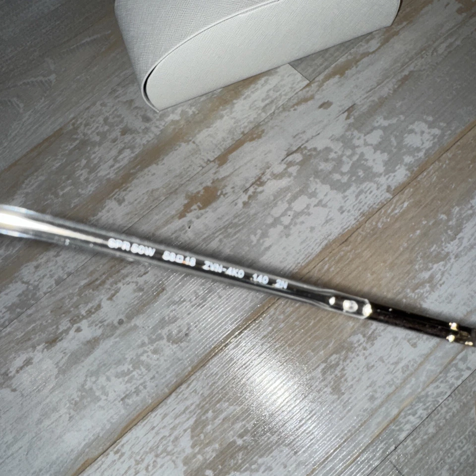 Очки солнцезащитные Prada PR50WS ZVN4K0 58 мм бледно-золотистые / розовые градиентные серые линзы - Изображение 4 из 4