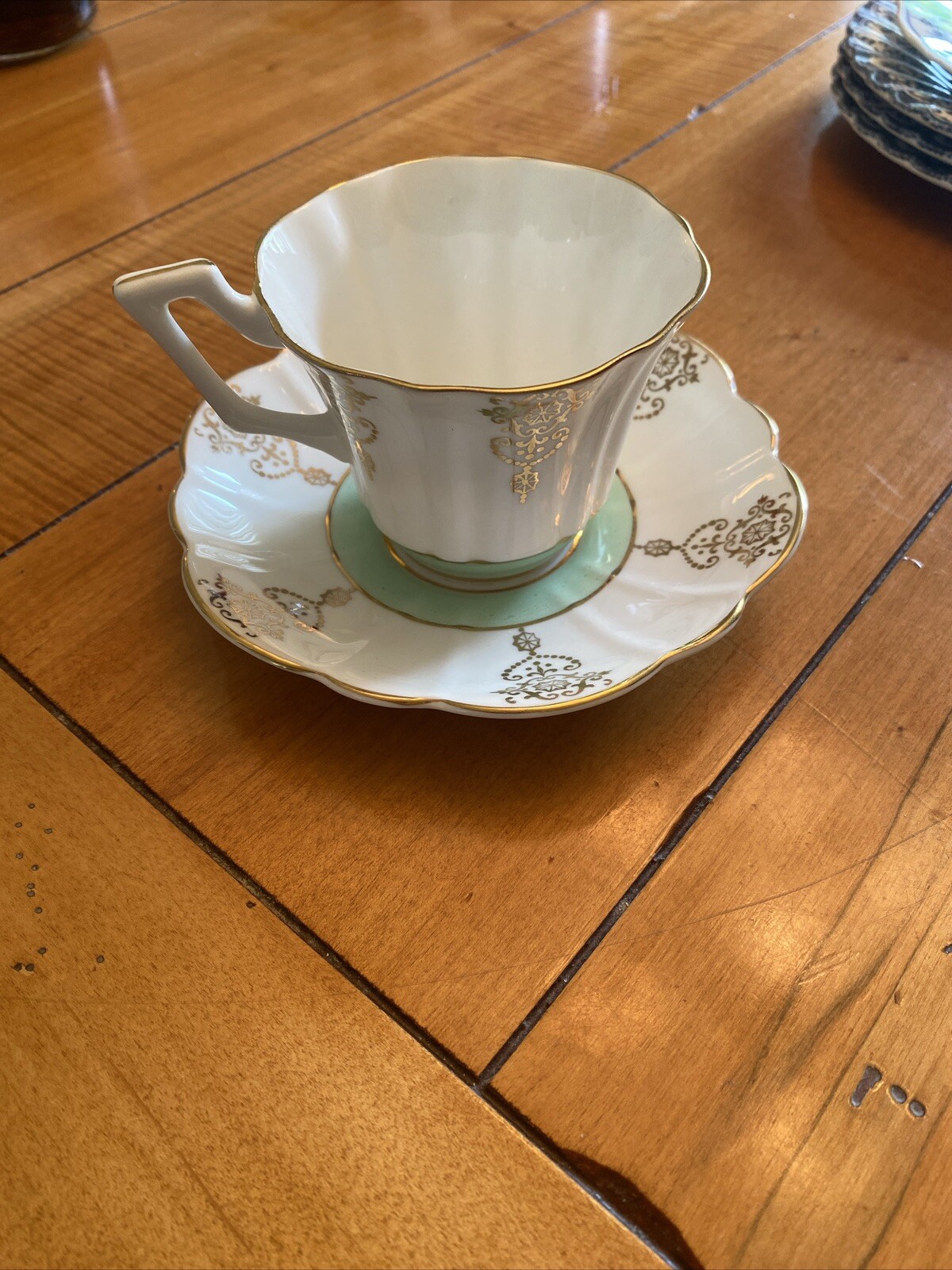 Vintage REGENCY English Cream gold Lt, Green Fine Bone China Tea Cup & Saucer