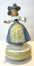 SCHMID MUSIC BOX LITTLE GIRL WITH LARGE HAT BLUE DRESS USED