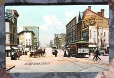 The Busy Corner, Utica, NY postally used 1908