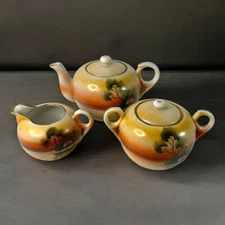 Vintage Japan Scenic Hand Painted Teapot Creamer and Sugar Set Lake Cottage Tree