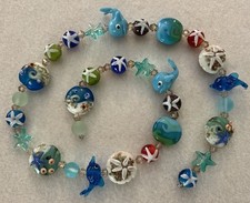 New 30 Piece Strand Ocean/SeaLife Themed LampWork Glass Beads/Starfish, Dolphins