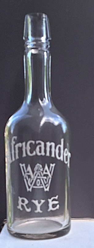 EARLY PRE-PROHIBITION  "AFRICANDER RYE"  ENAMELED BACK BAR BOTTLE,  FANCY LOGO