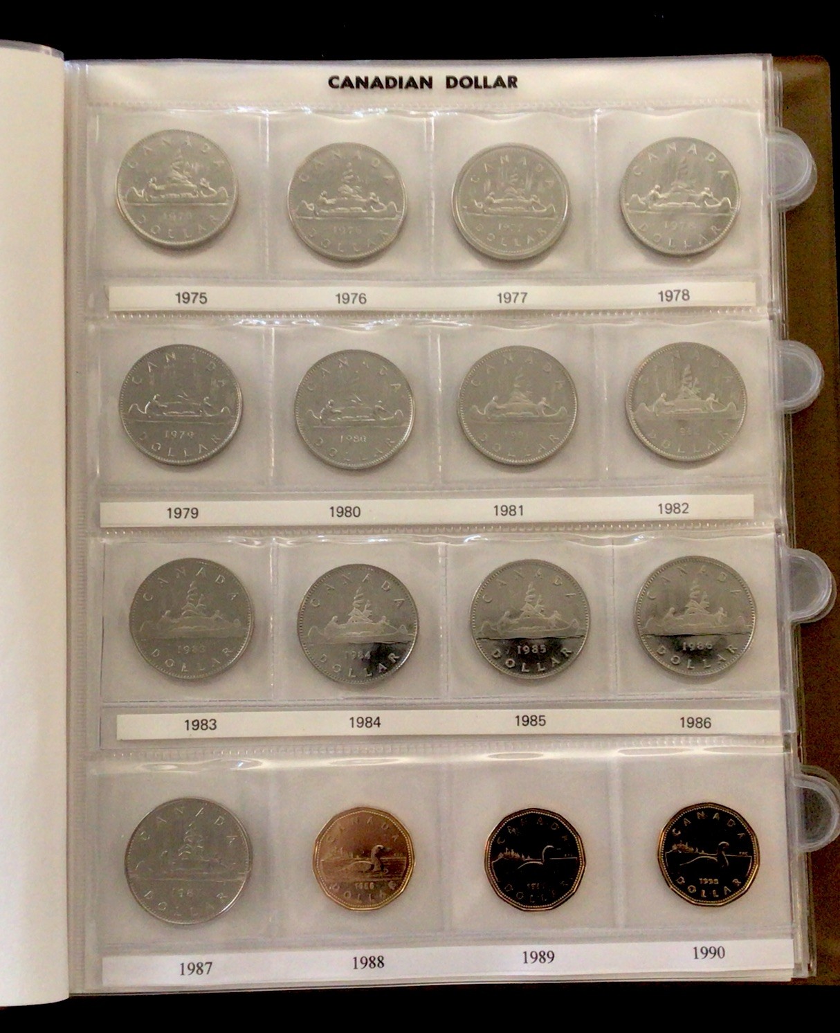 Canada Dollars 1935-1986 Uni-Safe Book! With 56 Coins 1965-2016! ENN Coins
