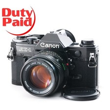 Excellent Canon AE-1 35mm film Camera Black NFD 50mm F/1.4 Lens set From JAPAN