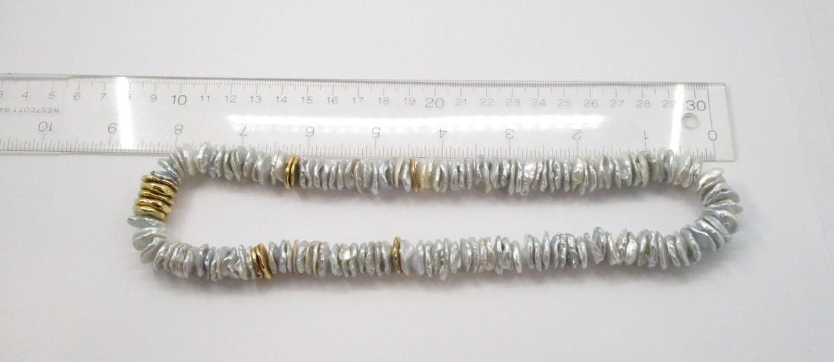 Strand of Twilight Blue Keshi Pearls With 18 Karat Yellow Gold Stations 18 1/2" View 5