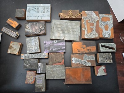 Lot of 25 antique wood printing blocks with various designs and images