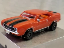 1969 Z-28 Camaro NU-RORA Dark Orange/Black  ho slot car with a TFX chassis 