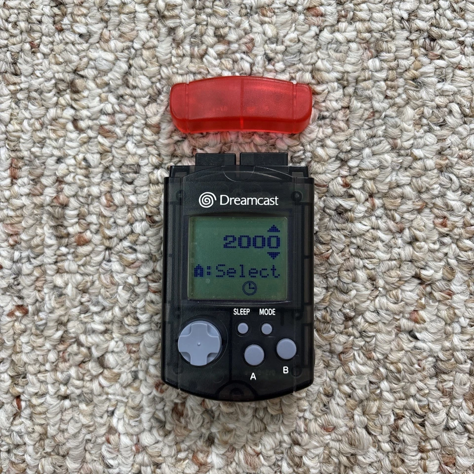 Unidad de memoria visual Sega Dreamcast VMU rojo transparente HKT-7000 con cubierta probada funcionando Foto 3 de 3