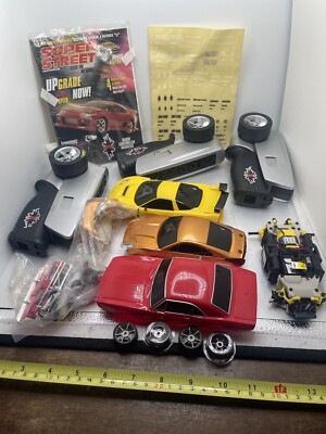 xmods rc car lot SOLD For PARTS ONLY Bodies Remotes Motors Etc As-Is Radio Shack