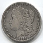 1884- MORGAN SILVER DOLLAR - 90% SILVER  -LOT # 178
