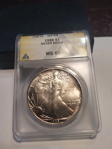 1988 AMERICAN SILVER EAGLE .999 FINE SILVER ANACS MS 68 TONED 1 TROY OUNCE