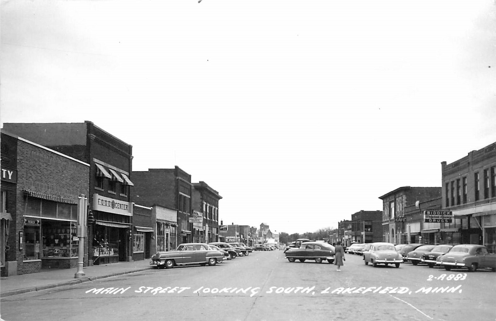 1940s Lakefield Minnesota Main Street Looking South autos RPPC Postcard 25-8595