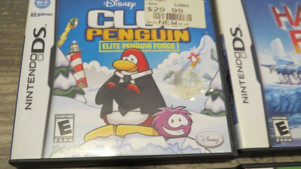 Nintendo DS Lote 4 Juegos Club Penguin, Zookeeper, Happy Feet, Veteranos de Emergencia Foto 2 de 4