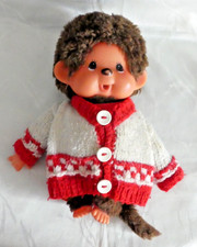 Moncchichi Figur  in roter  Jacke  und  Lätz...