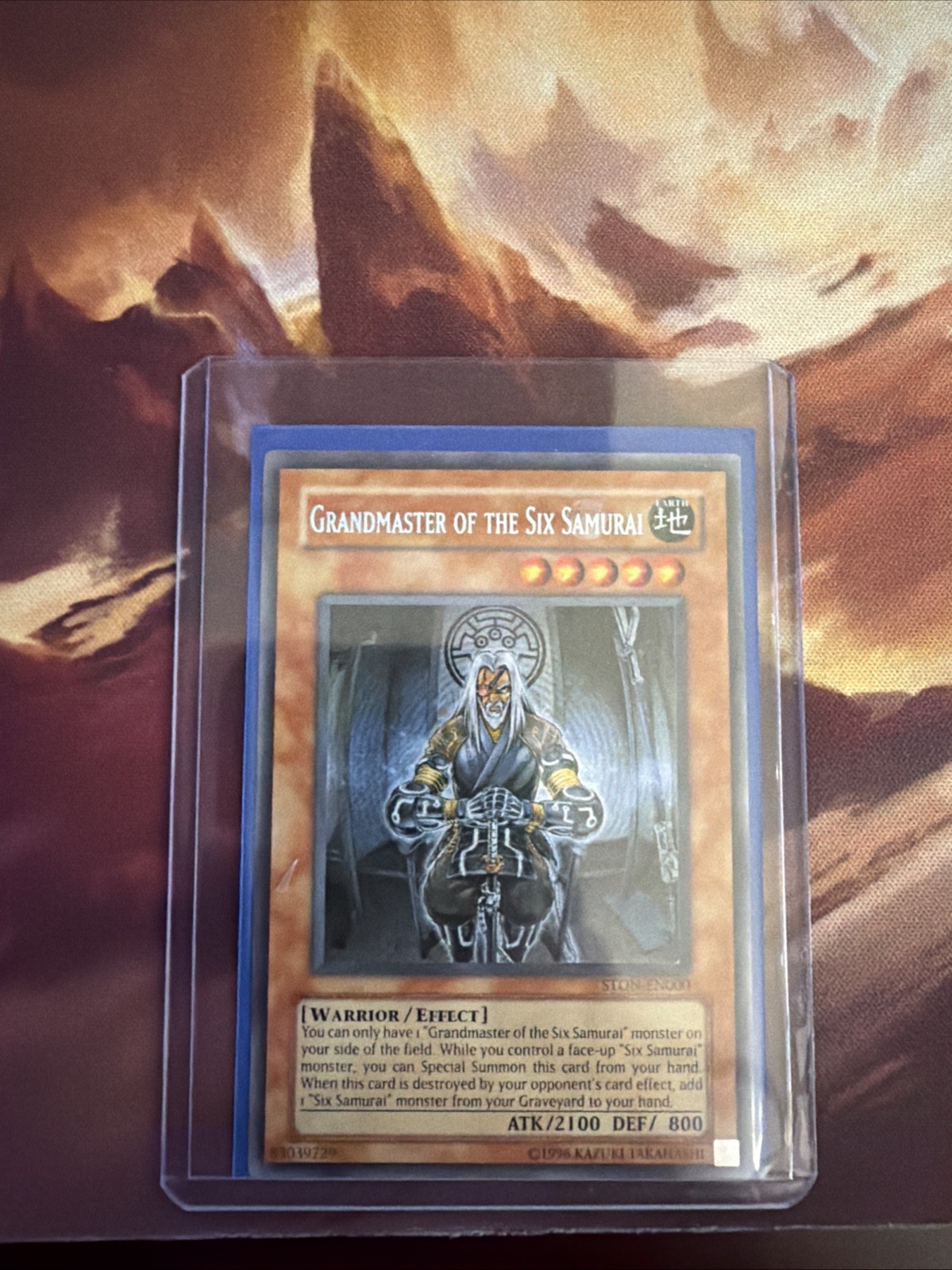 Grandmaster of the Six Samurai STON-EN000 YuGiOh Strike of Neos trading card — raw and PSA graded price guide