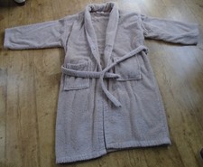Unisex top quality beige bathrobe One size. Great after the hot tub or spa 