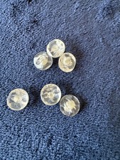 6 clear faceted old buttons