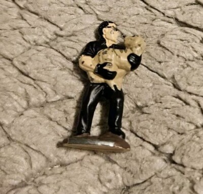 Jurassic Park Mini Figure Man Holding Raptor 1.25 Inches Tall