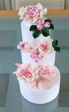 Sugar paste handmade figurine cake topper floral decor with roses