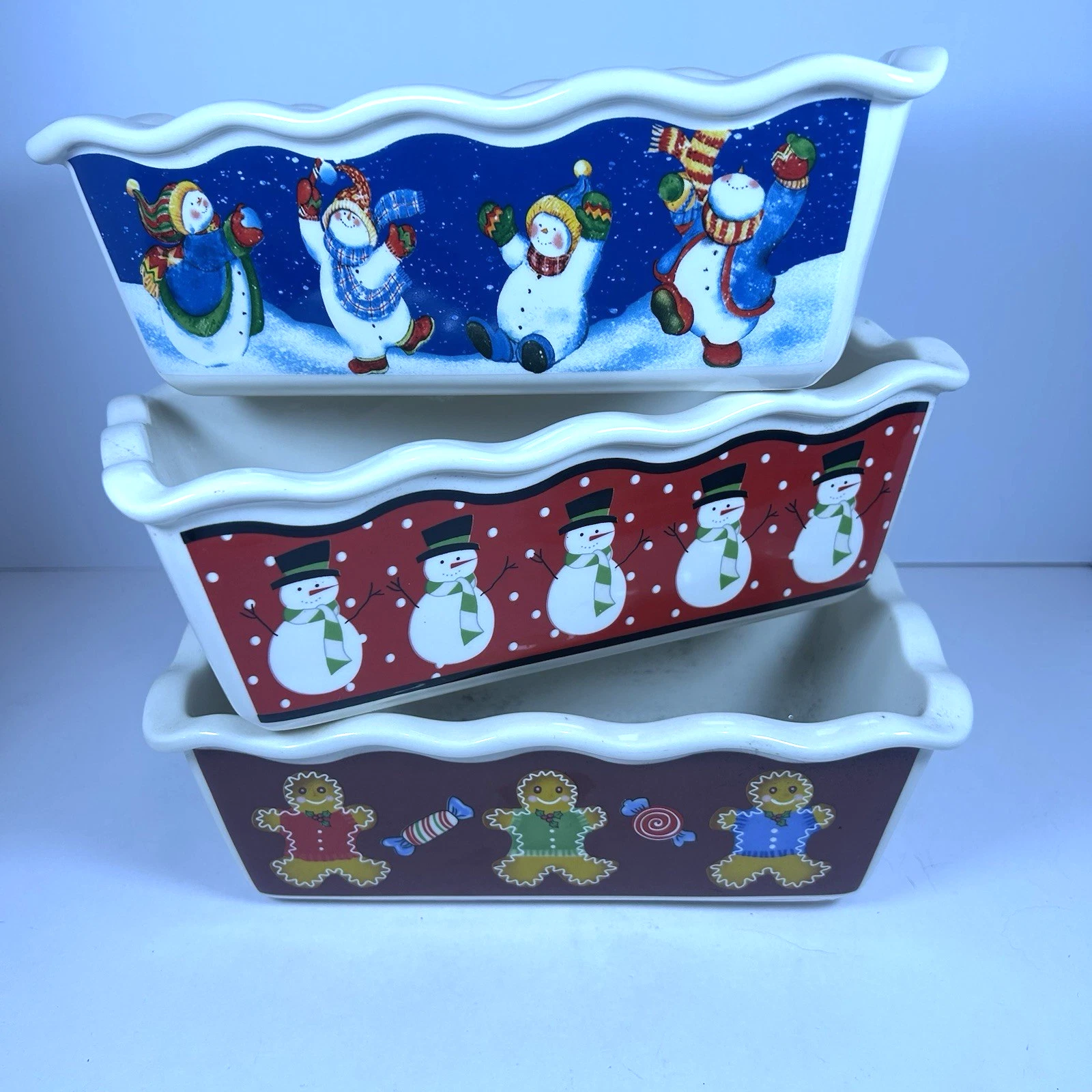 3 Garden Ridge 9 in Baking Loaf Pan Casseroles 2 Snowmen 1 Gingerbread Pan
