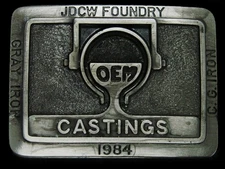 UB05114 *NOS* VINTAGE 1984 **JDCW FOUNDRY OEM CASTINGS C.G. IRON** BELT BUCKLE