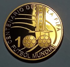 Moneda 2004 Centenario de la FIFA Dorada 40mm.