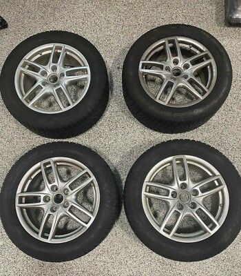 4 Dunlop SP Winter Sport 3D 265/50R19 Snow Tires with Porsche OEM Wheels