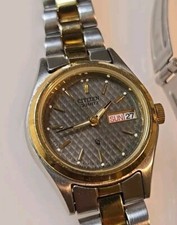 Citizen 6000-S44742 Womens Silver Gold Dual Tone Round Carbon Dial Watch